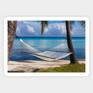 A Hammock Tied Between Two Palm Trees on Rangiroa In French Polynesia Sticker